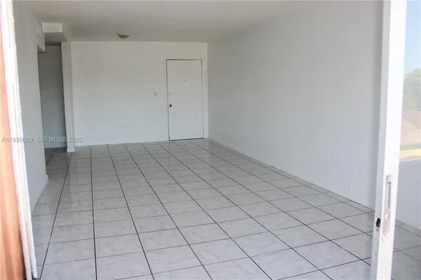 an empty room with cabinet