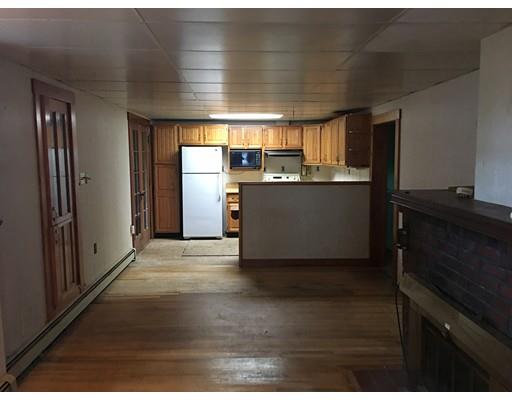 186 Flat Rock Road Athol, MA 01331 - Photo 7 of 13 a view of a refrigerator in kitchen and an empty room