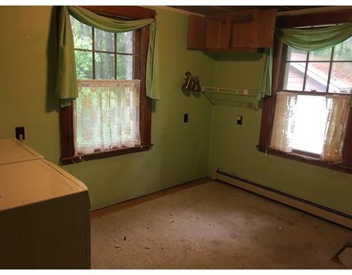 186 Flat Rock Road Athol, MA 01331 - Photo 9 of 13 a view of a room that has a window and a kitchen