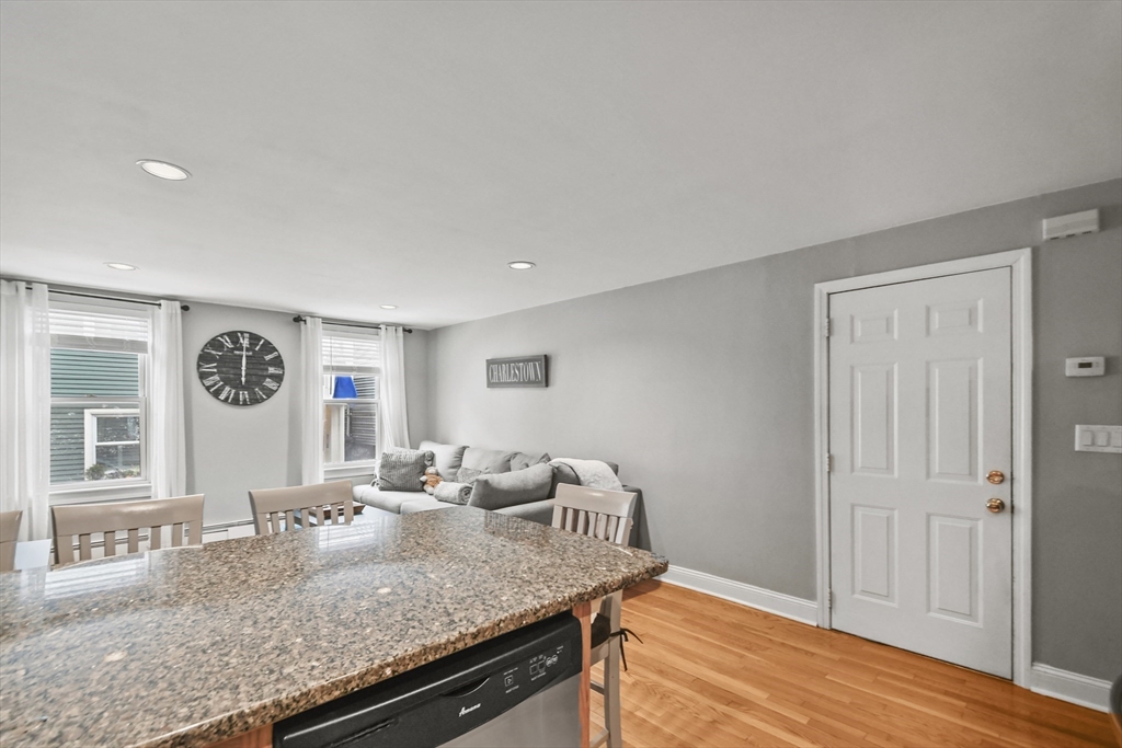 9 Allston Street, Unit 1 Boston, MA 02129 - Photo 11 of 19 a view of a kitchen with granite countertop lots of counter top space
