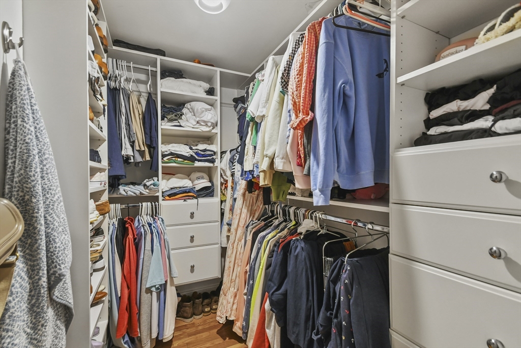 9 Allston Street, Unit 1 Boston, MA 02129 - Photo 14 of 19 a view of walk in closet with clothes and shoes