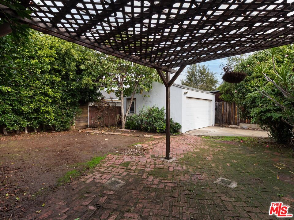 11729 Tennessee Avenue Los Angeles, CA 90064 - Photo 14 of 15 a house with trees in front of it