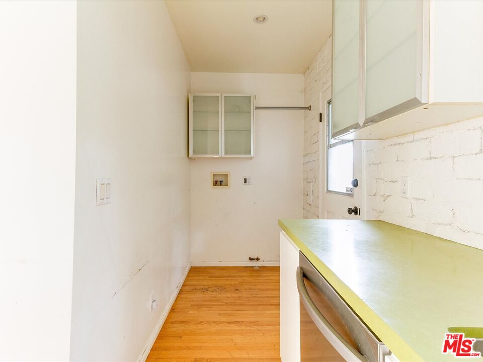 11729 Tennessee Avenue Los Angeles, CA 90064 - Photo 9 of 15 a view of a kitchen with a sink and dishwasher