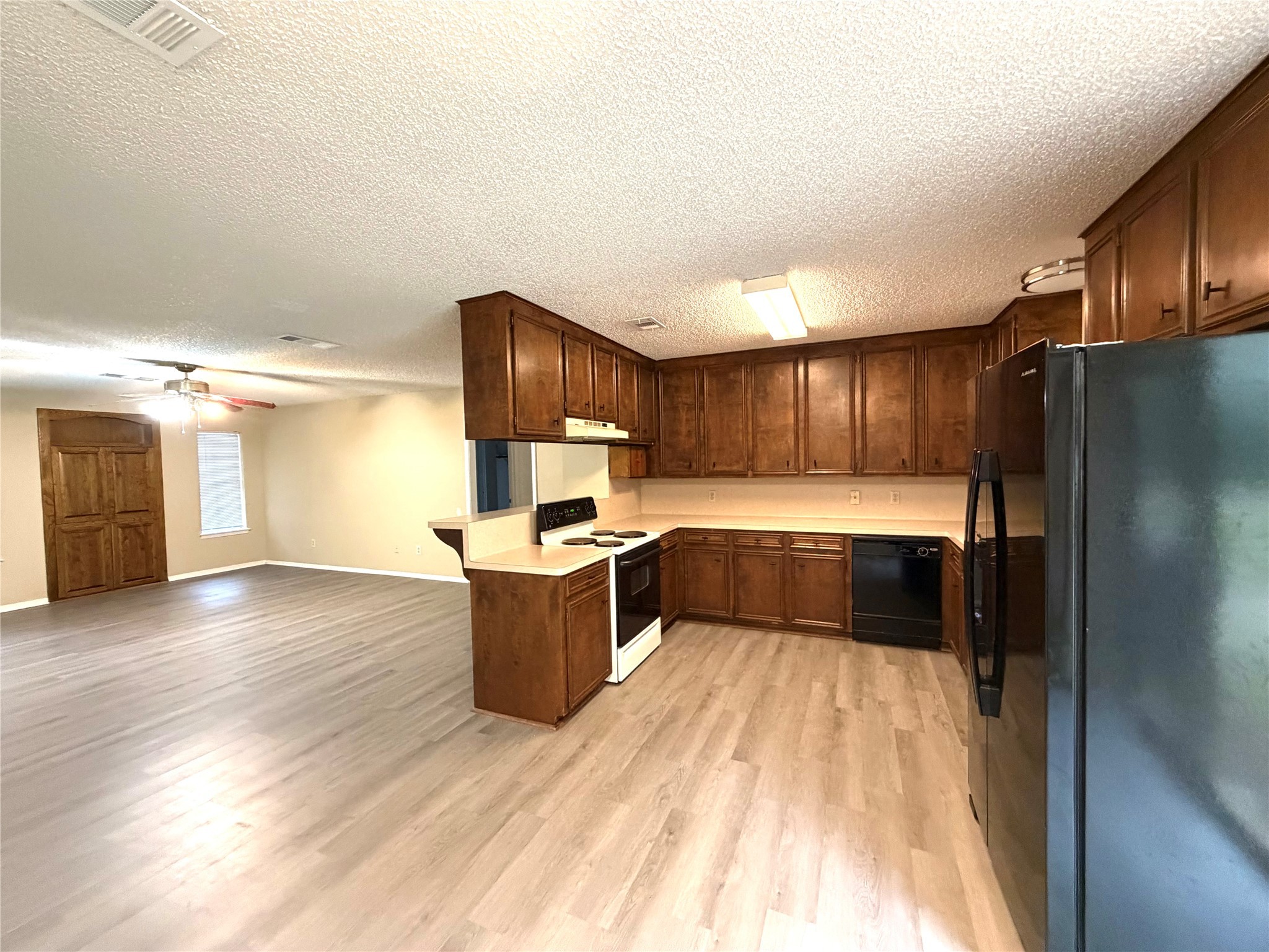 117 Kirk Road Livingston, TX 77351 - Photo 5 of 12 a large kitchen with a lot of counter space and stainless steel appliances