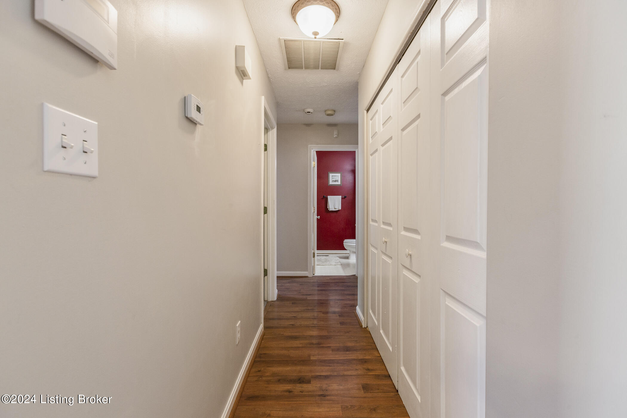 8318 Silver Fox Road Louisville, KY 40291 - Photo 14 of 35 Hallway with laundry