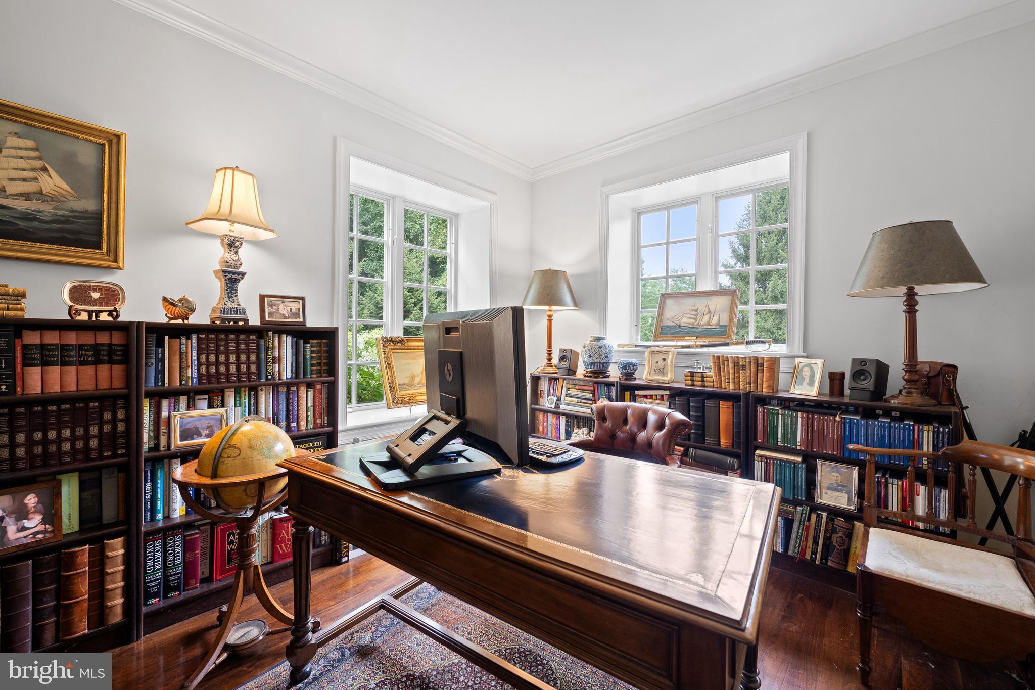 599 Longchamps Drive Wayne, PA 19087 - Photo 11 of 35 a view of a workspace with furniture and a window