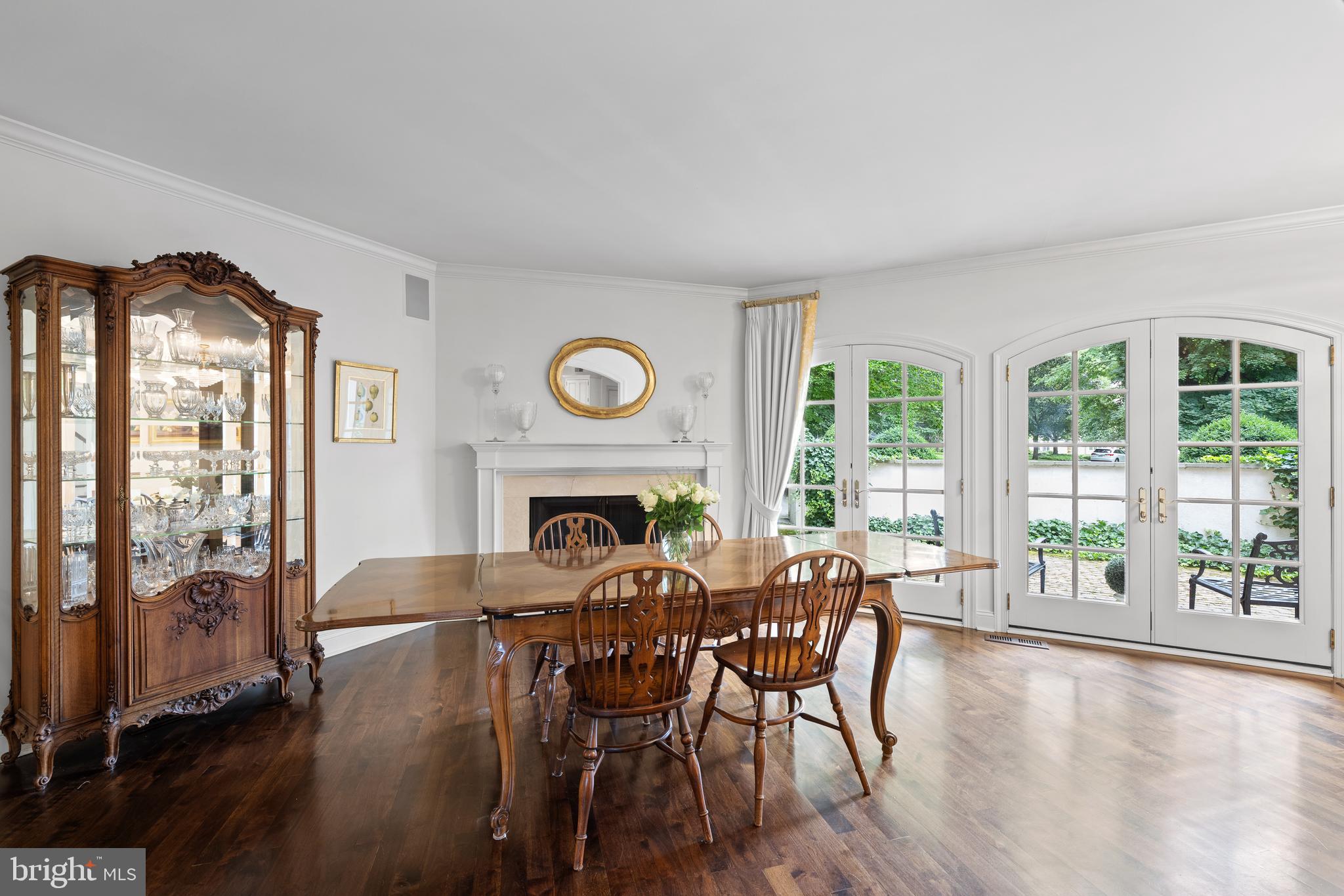 599 Longchamps Drive Wayne, PA 19087 - Photo 16 of 35 a view of a dining room with furniture window and wooden floor
