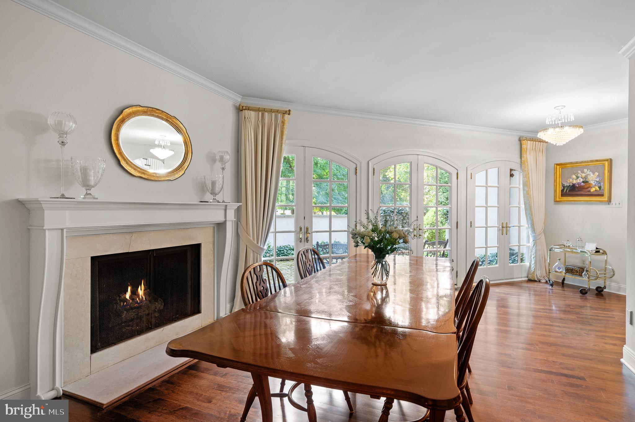 599 Longchamps Drive Wayne, PA 19087 - Photo 17 of 35 a view of a dining room with furniture window and wooden floor