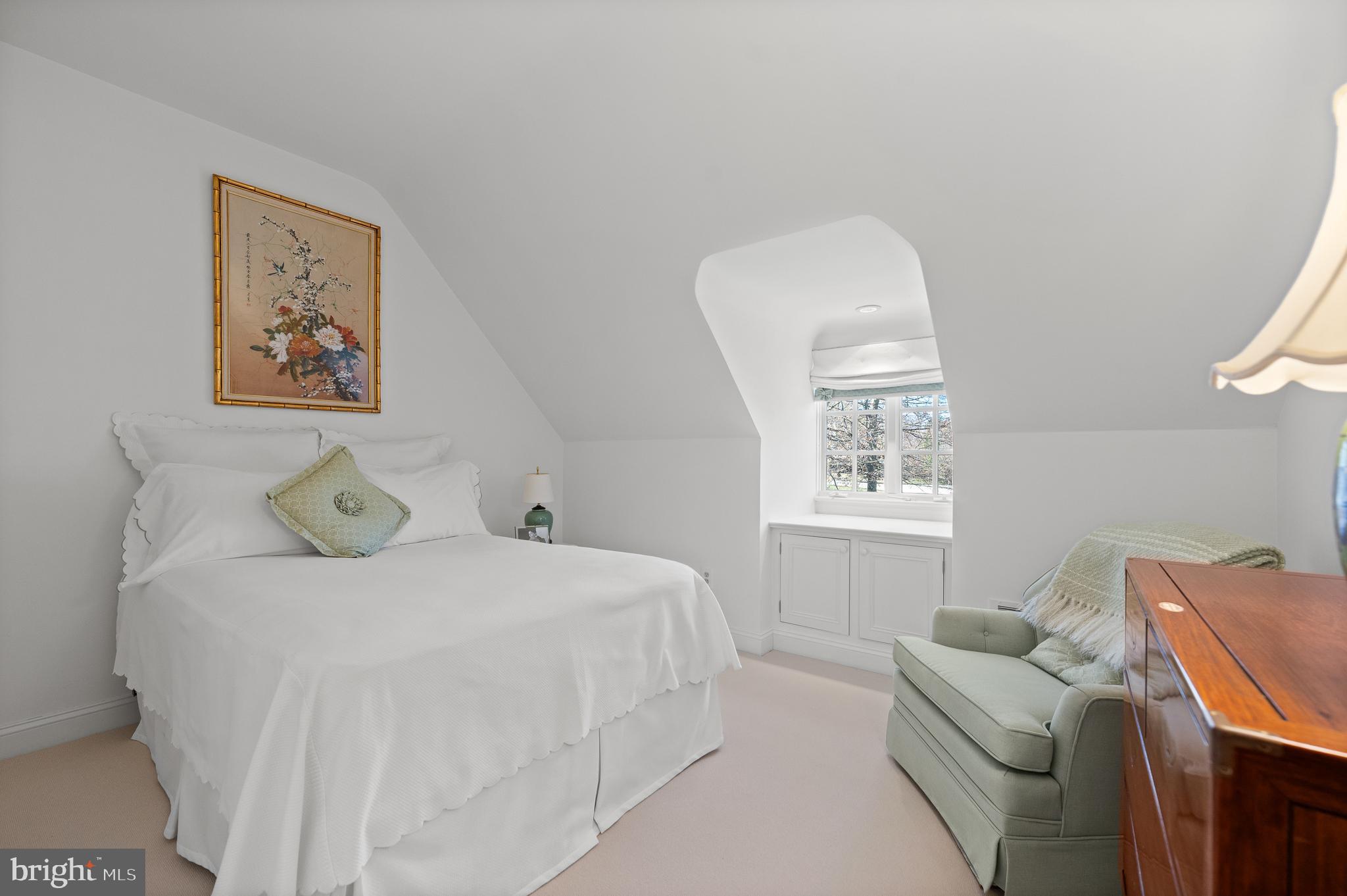 599 Longchamps Drive Wayne, PA 19087 - Photo 25 of 35 a bedroom with a bed and a couch