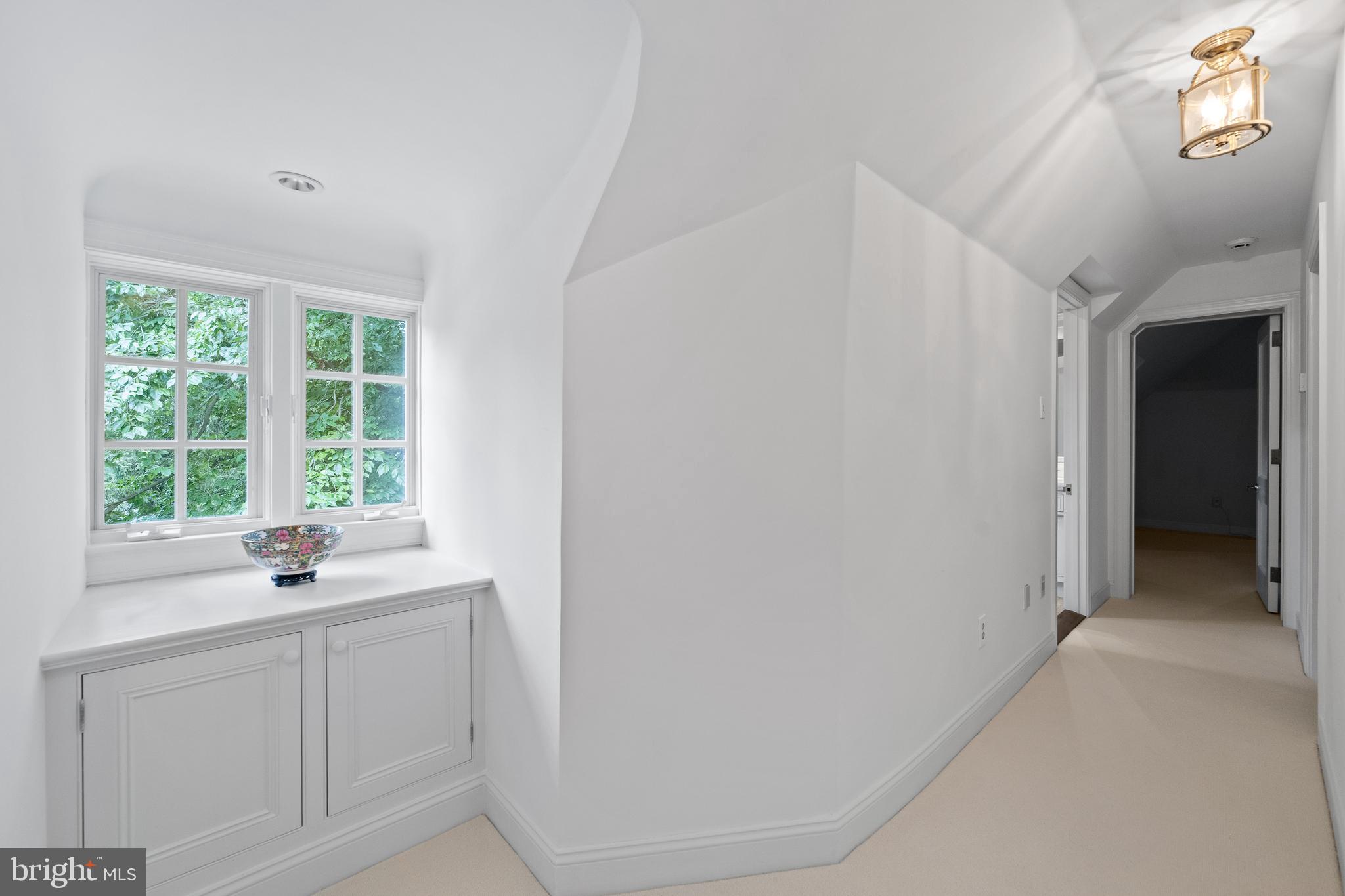 599 Longchamps Drive Wayne, PA 19087 - Photo 26 of 35 a bathroom with a sink and a window