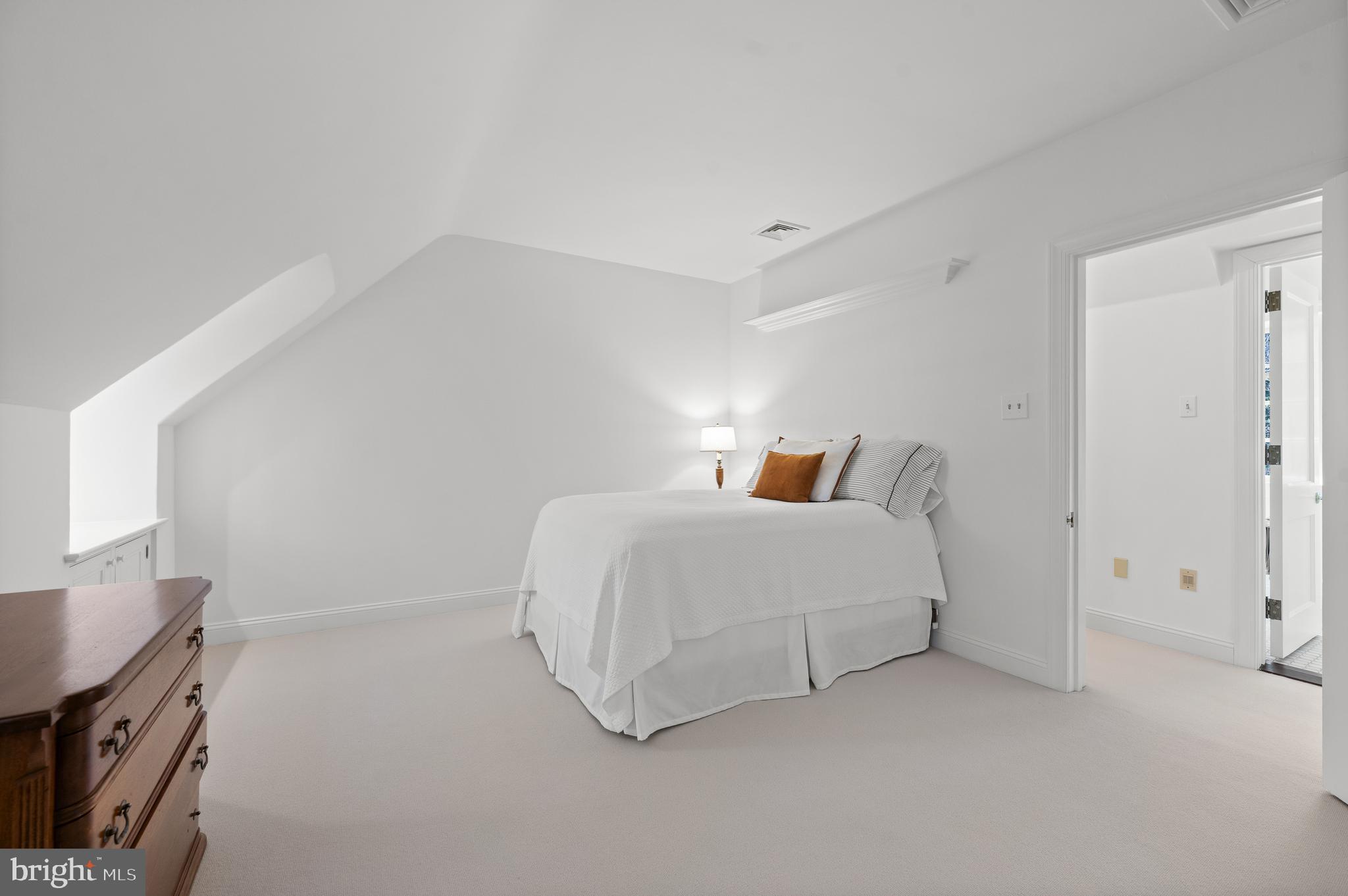 599 Longchamps Drive Wayne, PA 19087 - Photo 28 of 35 a bed room with a bed and a window