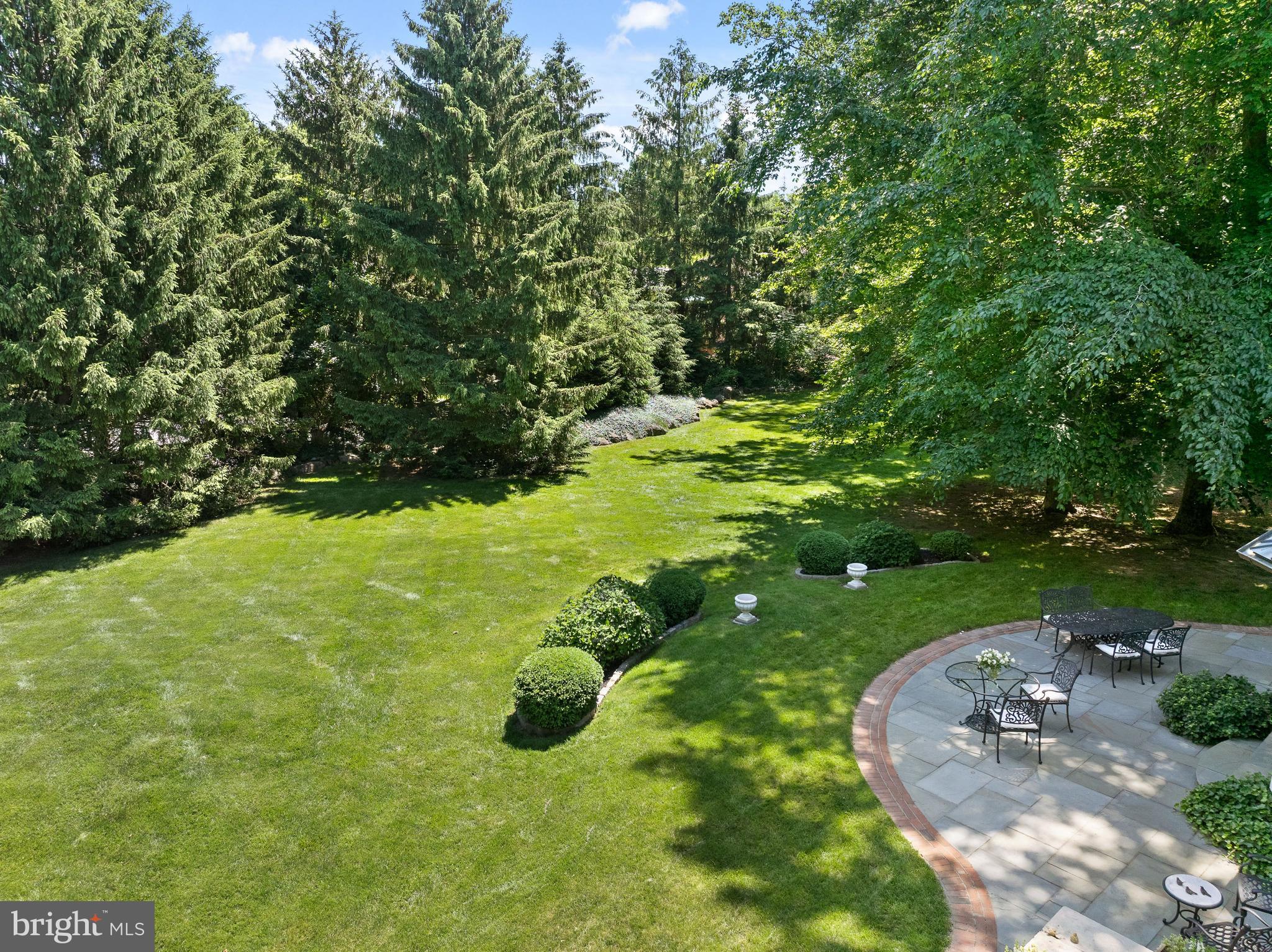 599 Longchamps Drive Wayne, PA 19087 - Photo 31 of 35 a view of a golf course with a garden