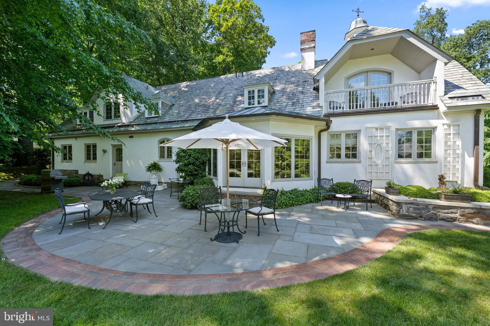 599 Longchamps Drive Wayne, PA 19087 - Photo 32 of 35 a front view of house with a outdoor seating