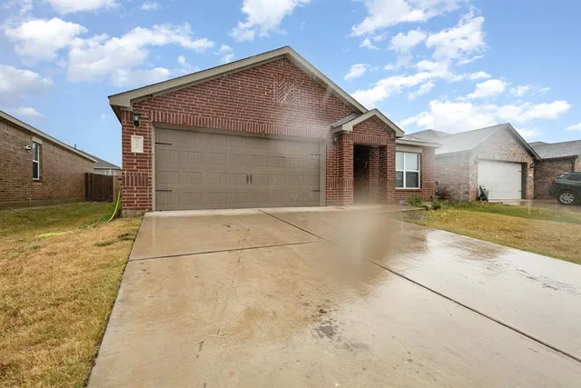 a bathroom with a sink and a yard