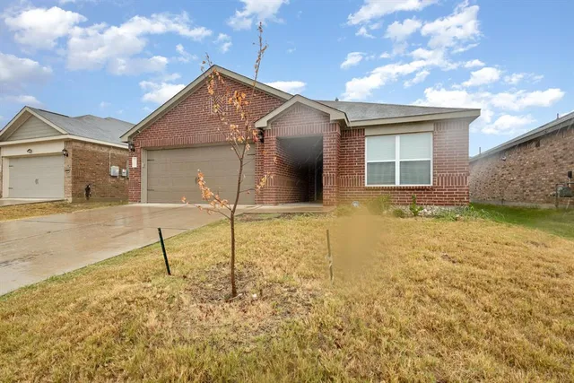 a house view with a backyard space
