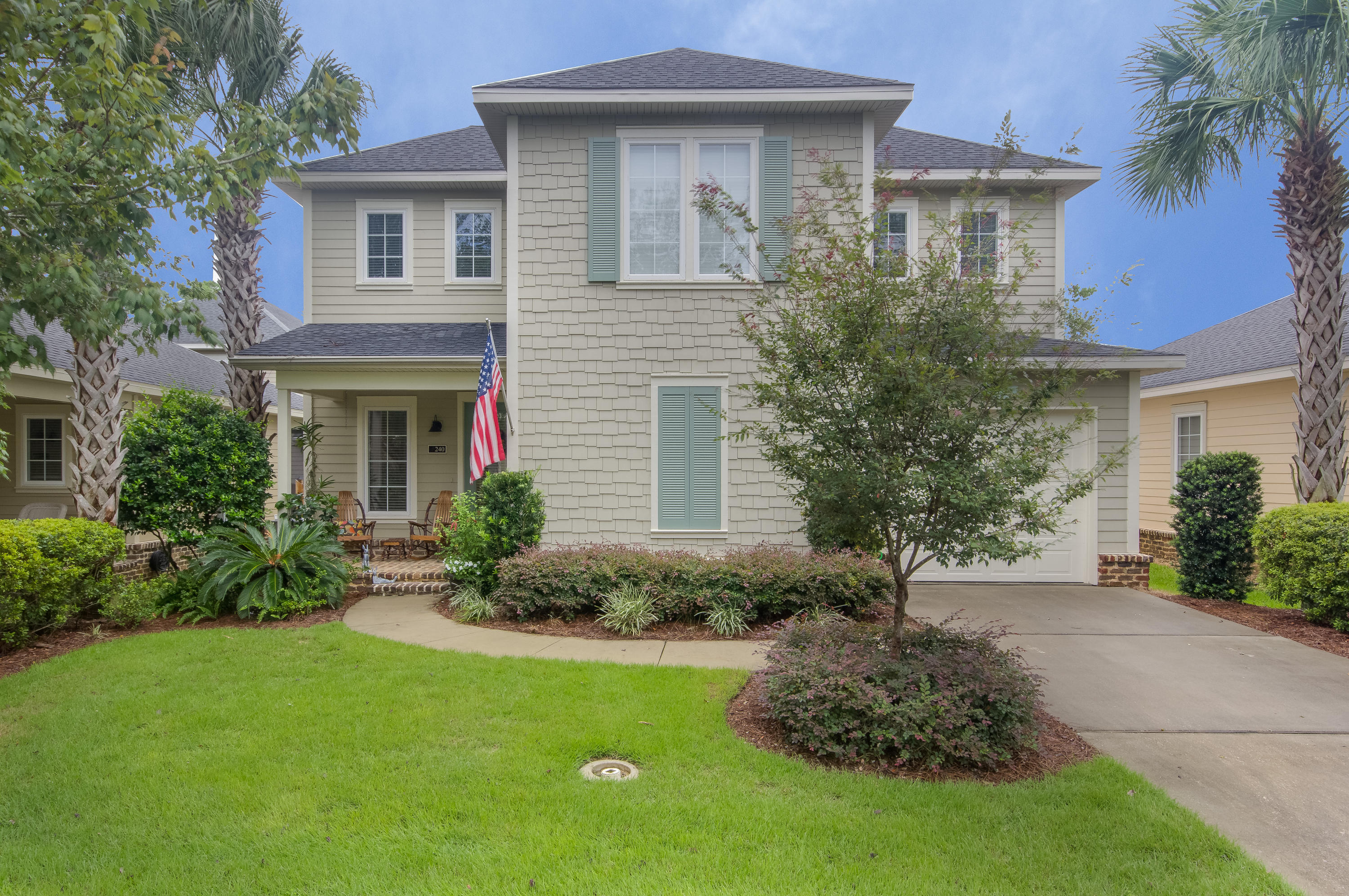 240 South Zander Way Santa Rosa Beach, FL 32459 - Photo 1 of 19 a front view of house with yard and green space