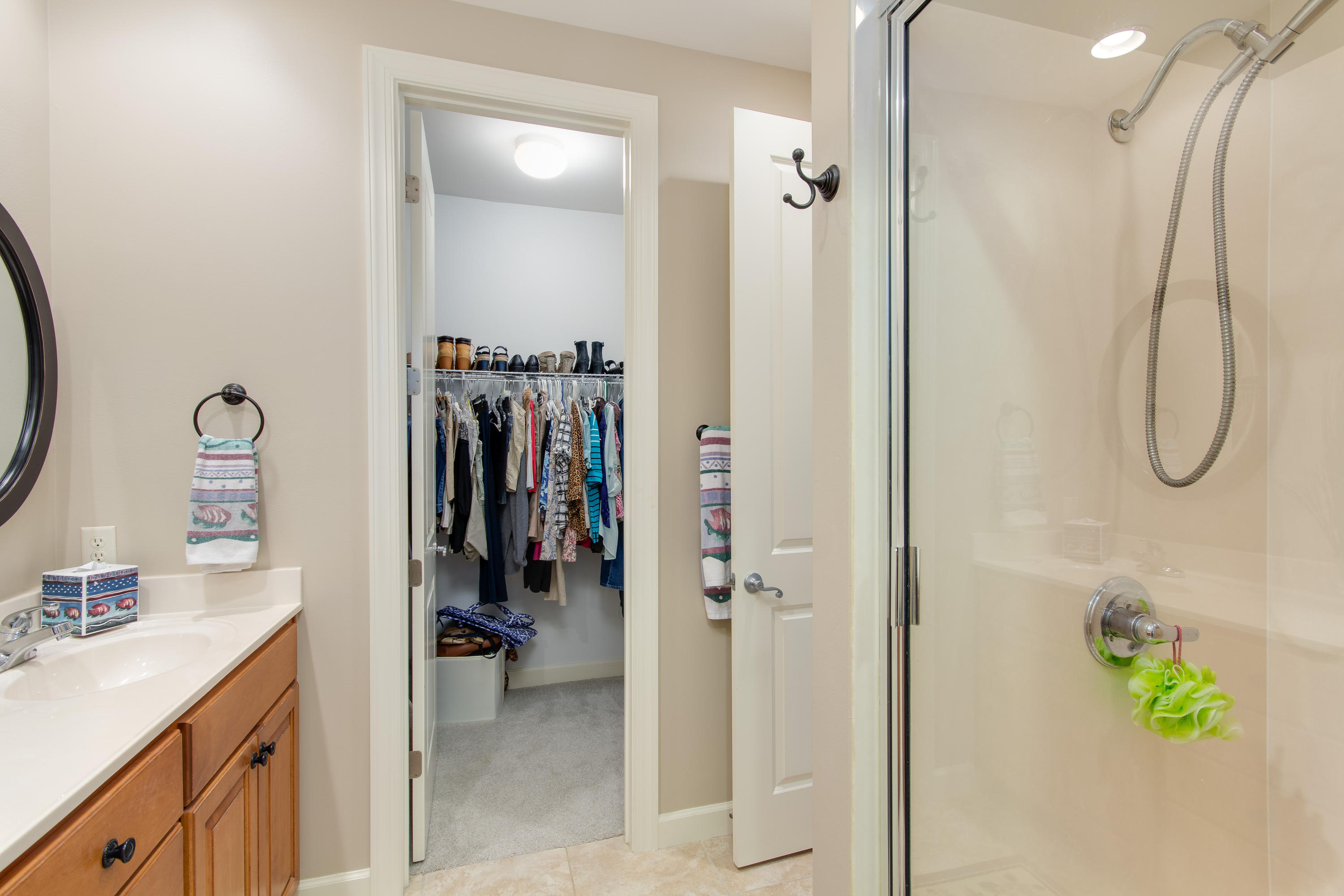 240 South Zander Way Santa Rosa Beach, FL 32459 - Photo 11 of 19 a bathroom with a shower and a sink