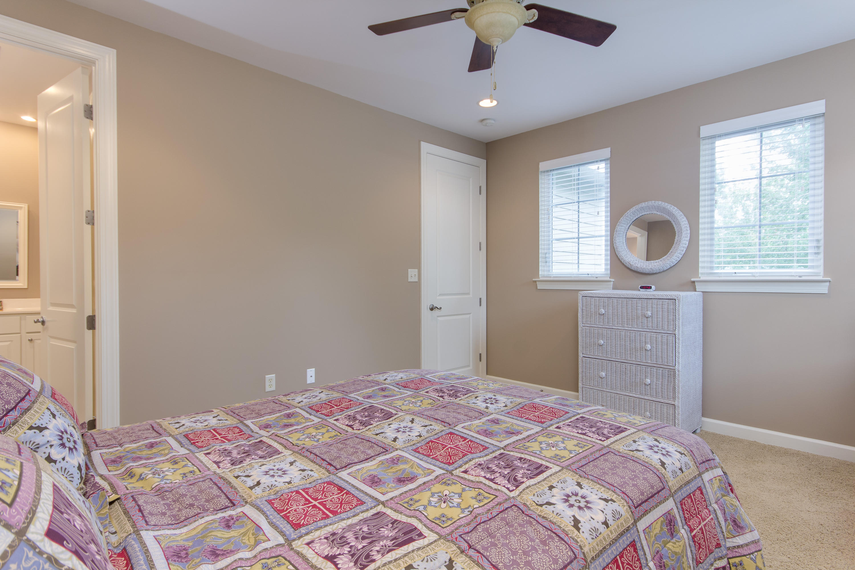 240 South Zander Way Santa Rosa Beach, FL 32459 - Photo 13 of 19 a bedroom with a bed and a window