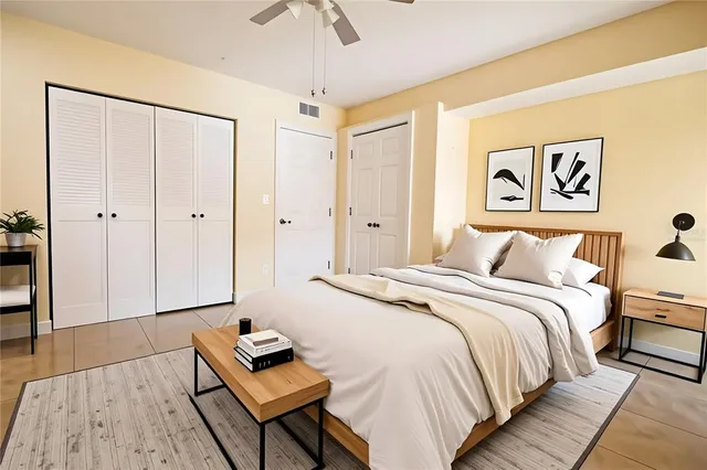 a bedroom with a bed and a dresser