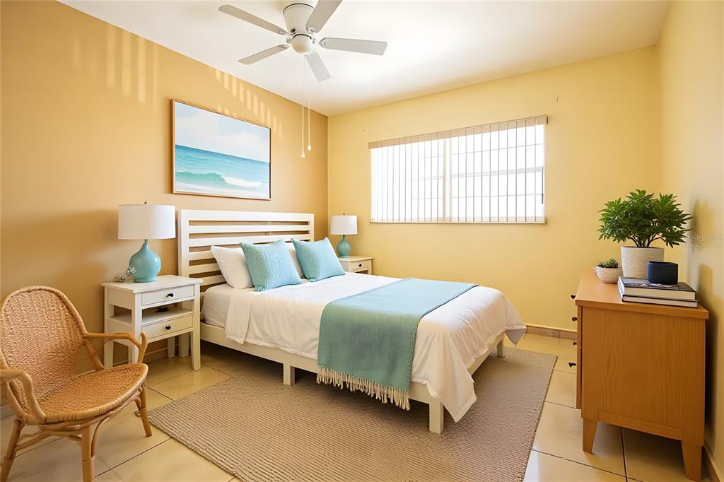 4742 Azalea Drive, Unit 203 New Port Richey, FL 34652 - Photo 20 of 32 a bedroom with a bed chair and roof