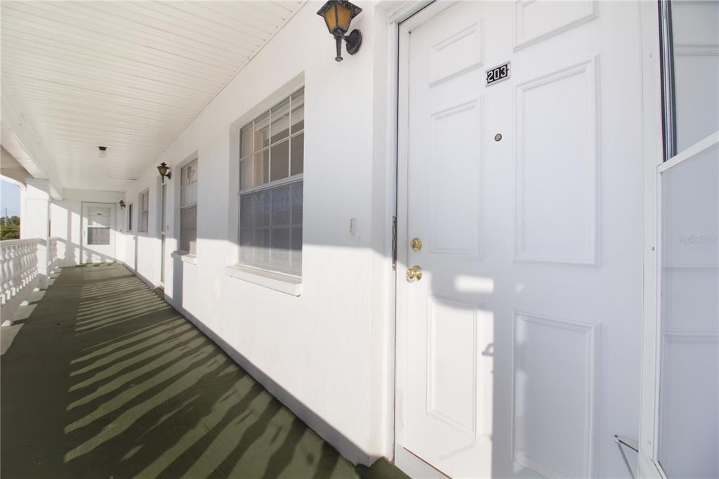 4742 Azalea Drive, Unit 203 New Port Richey, FL 34652 - Photo 22 of 32 a view of a balcony