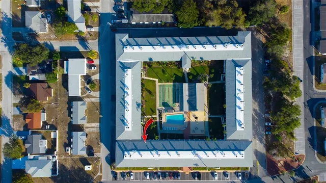 a view of a building with a bunch of people