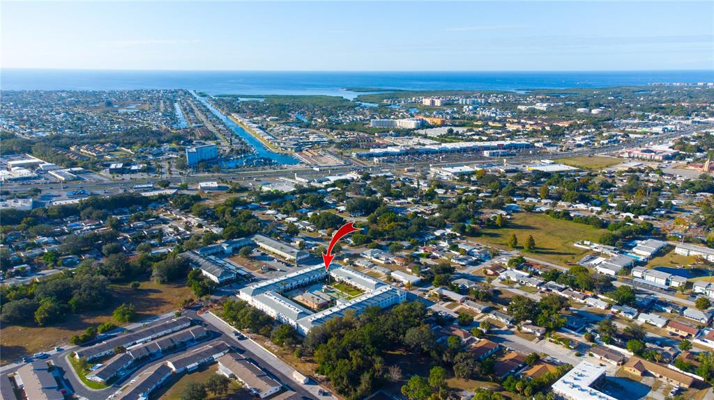 4742 Azalea Drive, Unit 203 New Port Richey, FL 34652 - Photo 27 of 32 an aerial view of multiple house