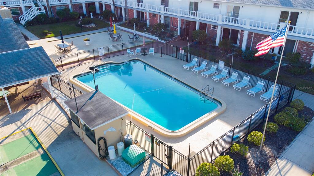 4742 Azalea Drive, Unit 203 New Port Richey, FL 34652 - Photo 29 of 32 a view of a couches with wooden floor