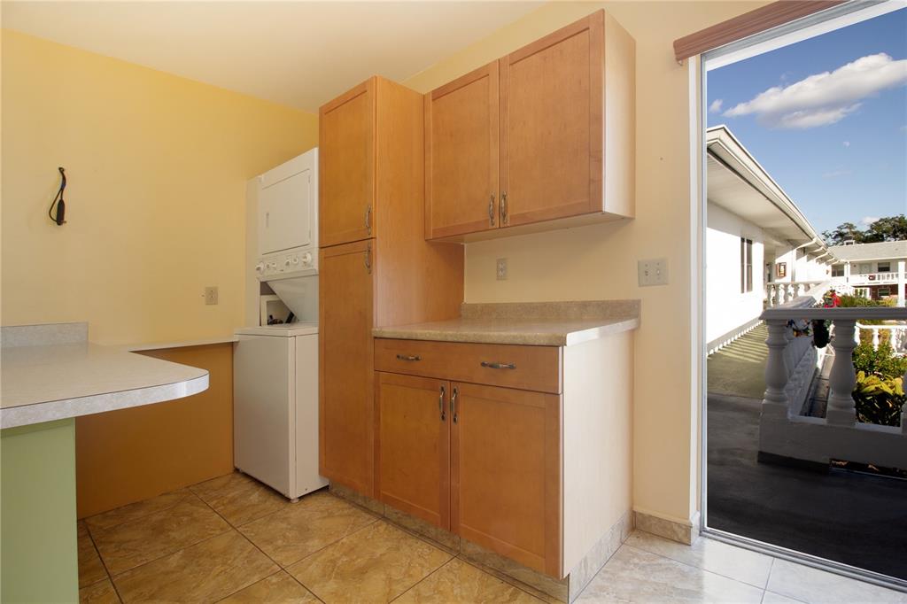 4742 Azalea Drive, Unit 203 New Port Richey, FL 34652 - Photo 8 of 32 a bathroom with a sink and a mirror