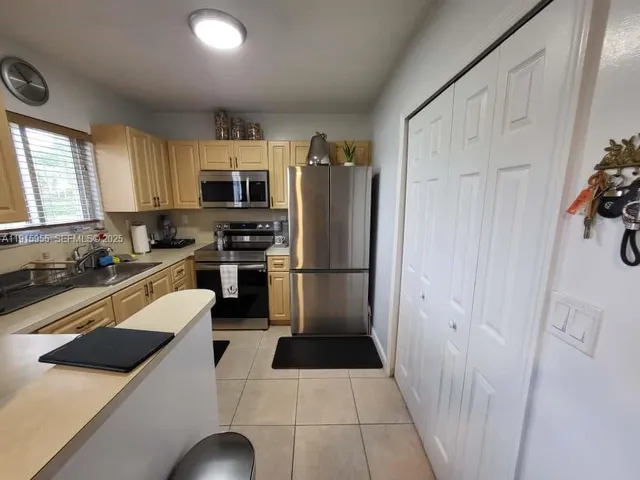 a view of a garden with a lake view