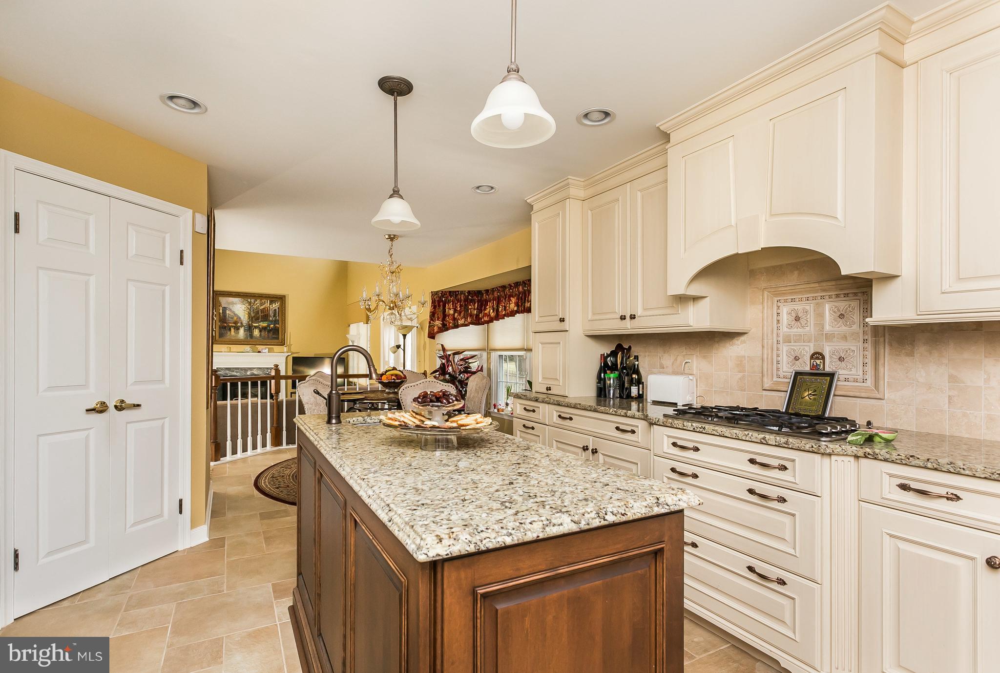 9111 Gardenia Road Baltimore, MD 21236 - Photo 11 of 30 a kitchen with sink stove and cabinets