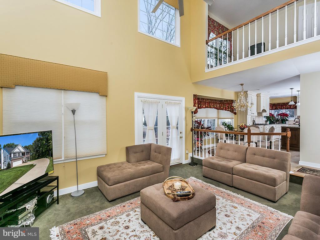 9111 Gardenia Road Baltimore, MD 21236 - Photo 16 of 30 a living room with furniture and a rug