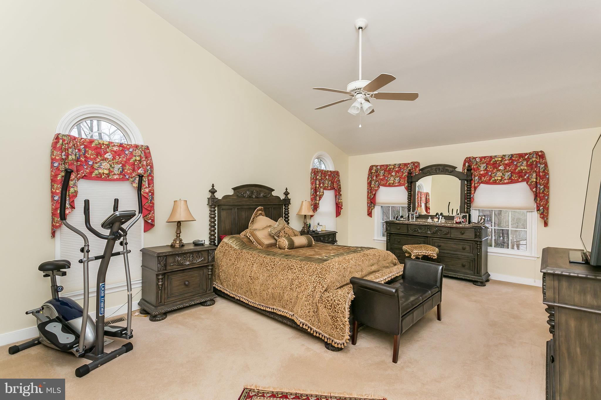 9111 Gardenia Road Baltimore, MD 21236 - Photo 17 of 30 a bedroom with a bed dresser and window