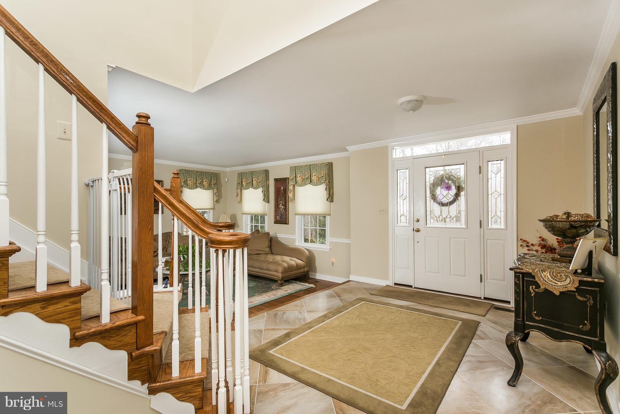 9111 Gardenia Road Baltimore, MD 21236 - Photo 3 of 30 a view of a livingroom with furniture and front door