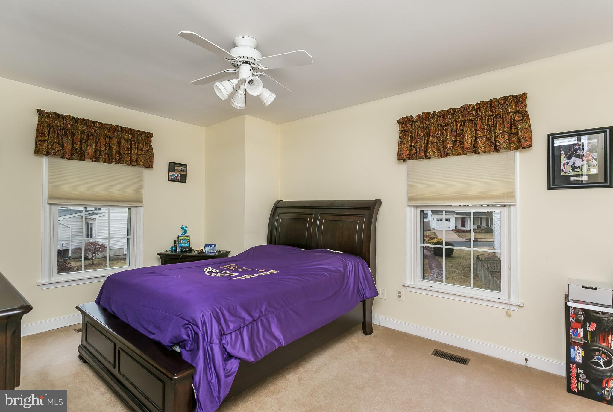 9111 Gardenia Road Baltimore, MD 21236 - Photo 23 of 30 a bedroom with a bed and a window