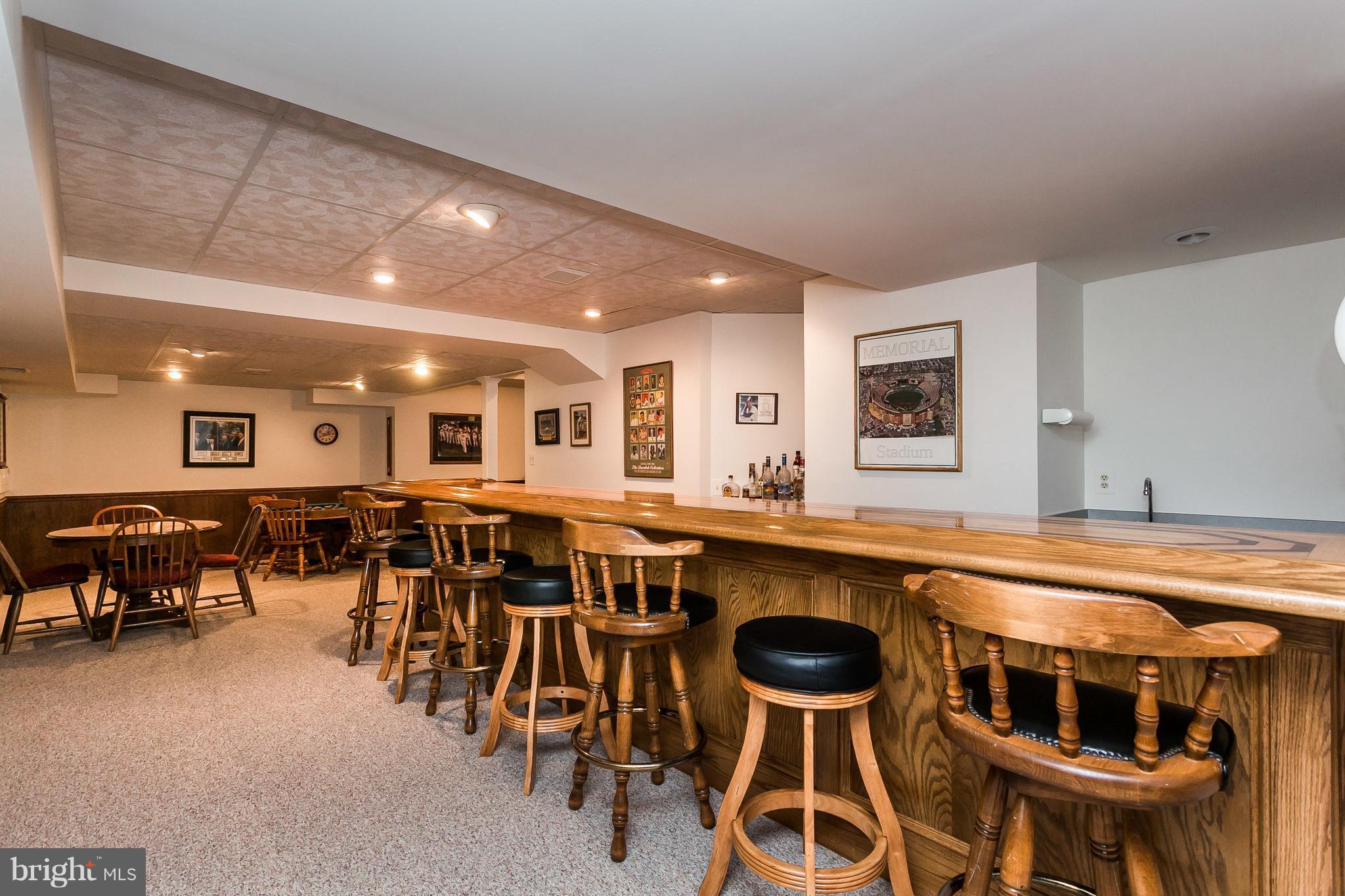 9111 Gardenia Road Baltimore, MD 21236 - Photo 27 of 30 a dinning area with lots of furniture and wooden floor