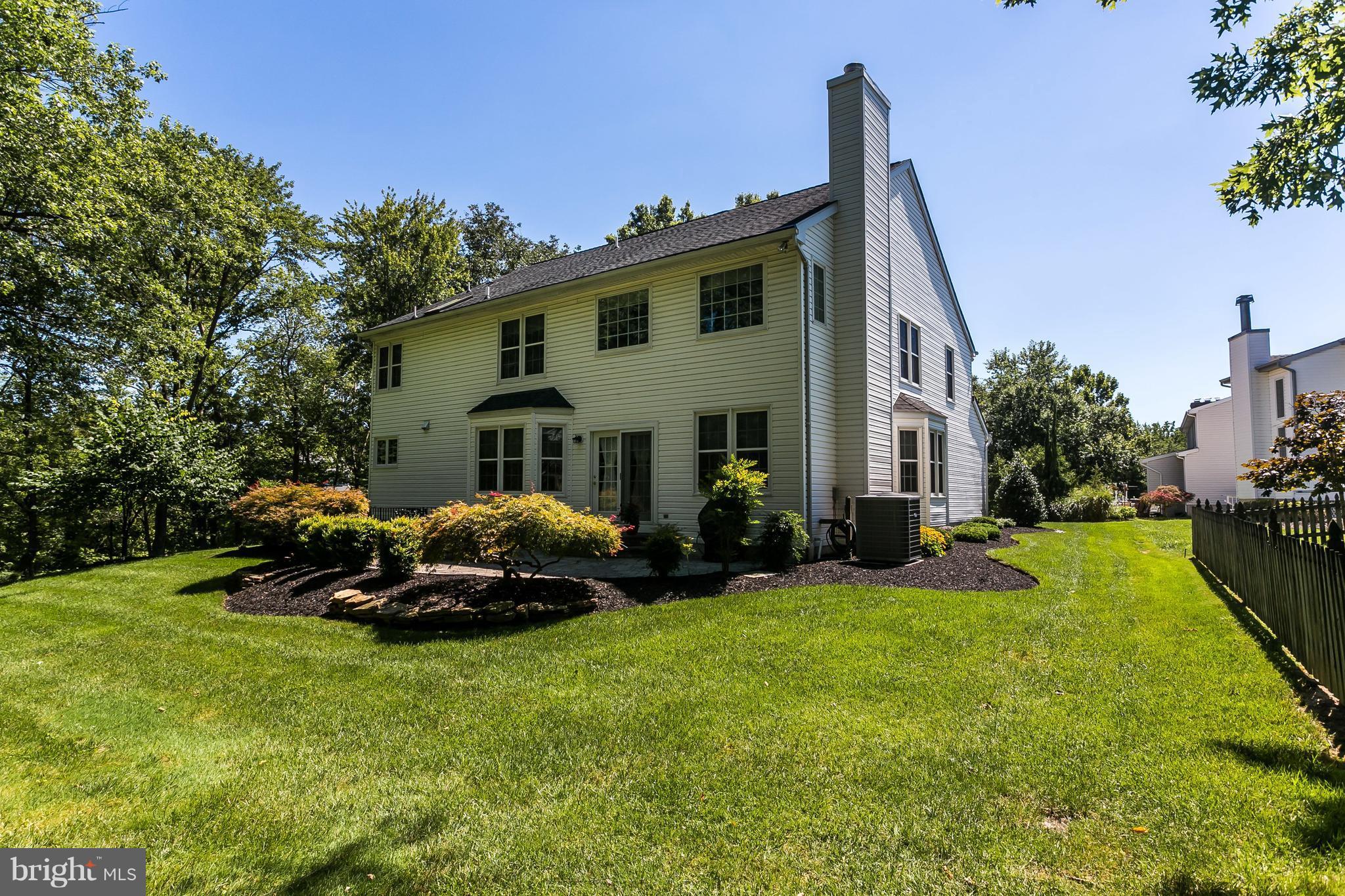 9111 Gardenia Road Baltimore, MD 21236 - Photo 29 of 30 a front view of a house with garden