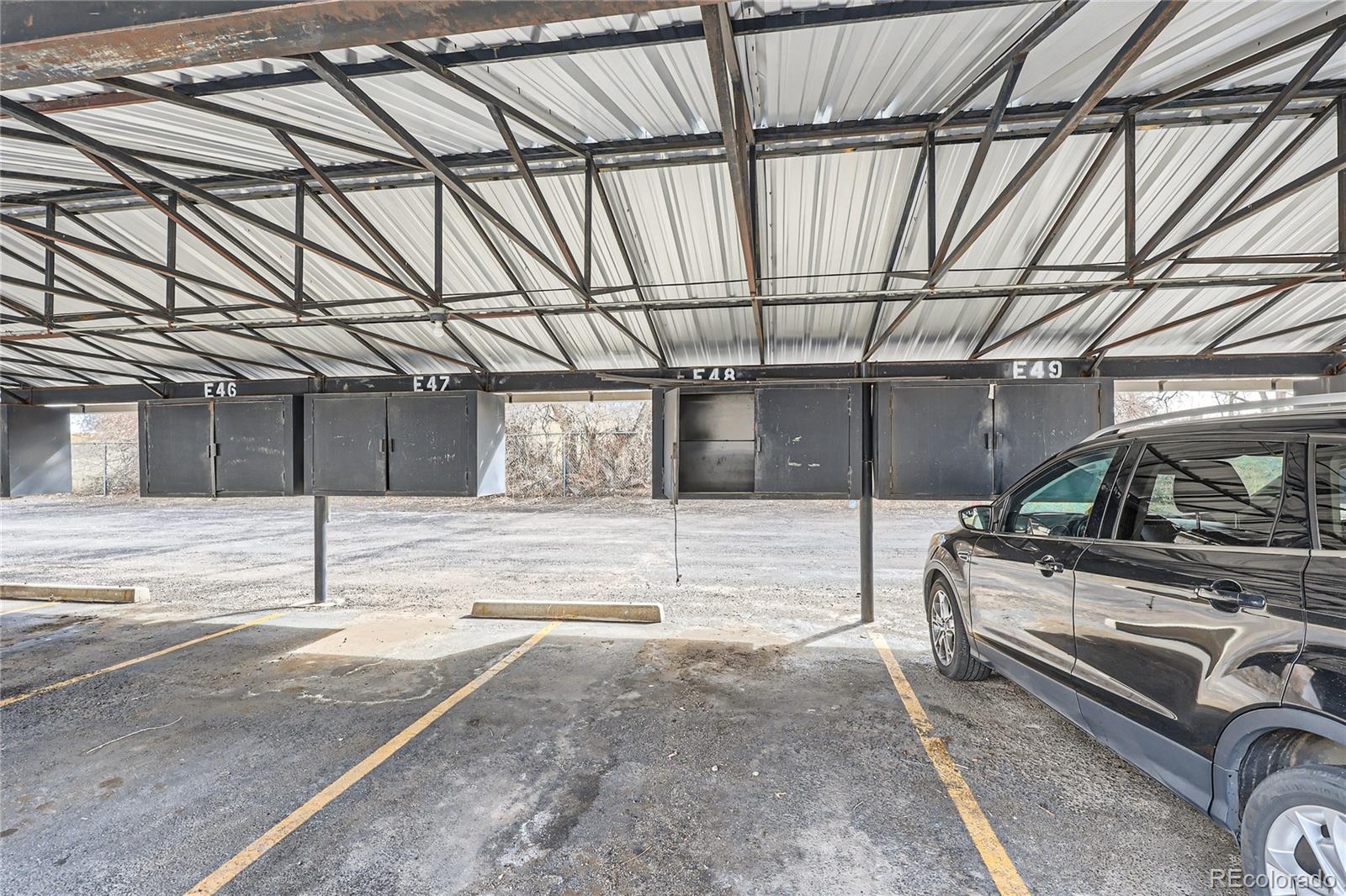 384 South Ironton Street, Unit 314 Aurora, CO 80012 - Photo 12 of 12 a view of a garage