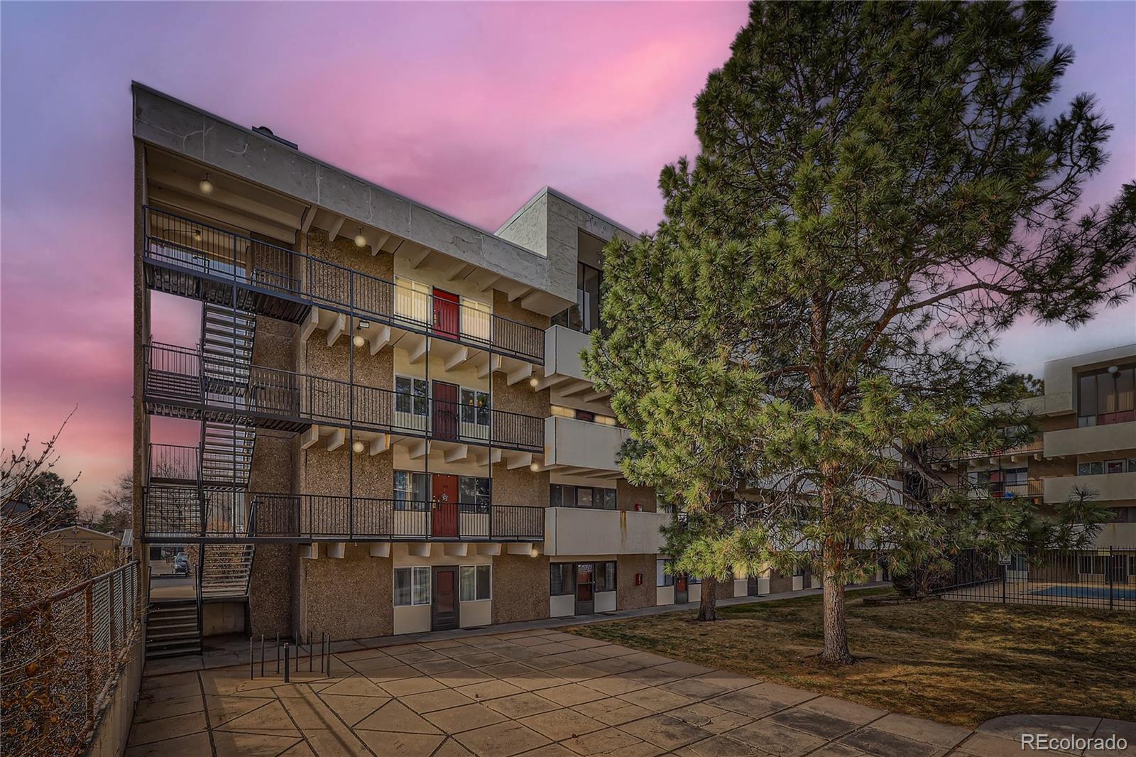 384 South Ironton Street, Unit 314 Aurora, CO 80012 - Photo 9 of 12 a front view of a building