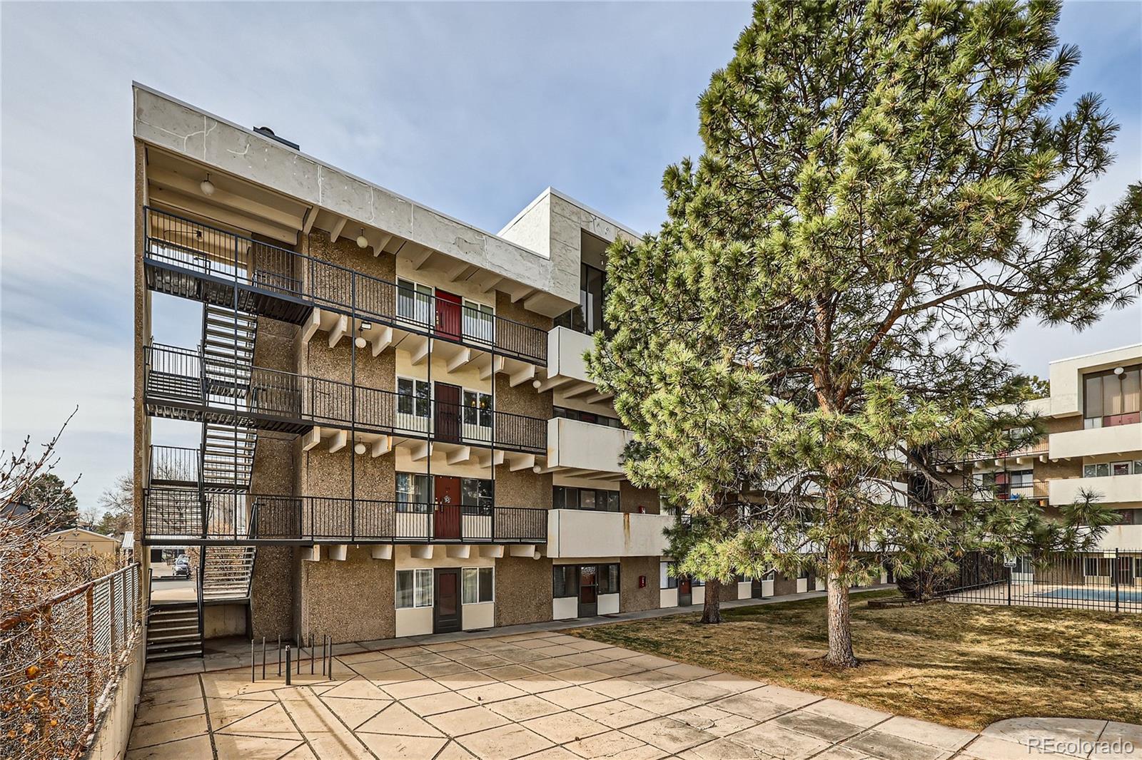 384 South Ironton Street, Unit 314 Aurora, CO 80012 - Photo 10 of 12 a front view of a building