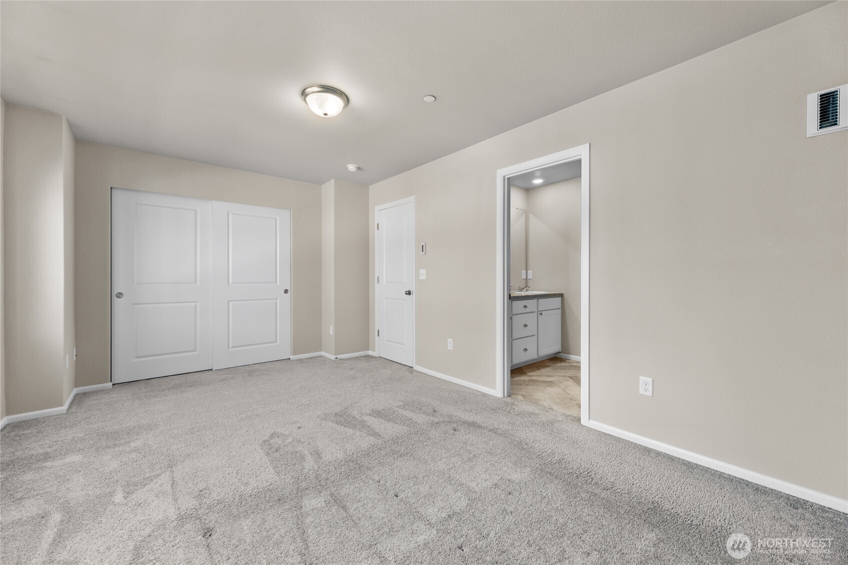 17417 118th Ave Court East, Unit E Puyallup, WA 98374 - Photo 16 of 31 a view of an empty room