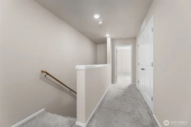 a view of a hallway with closet