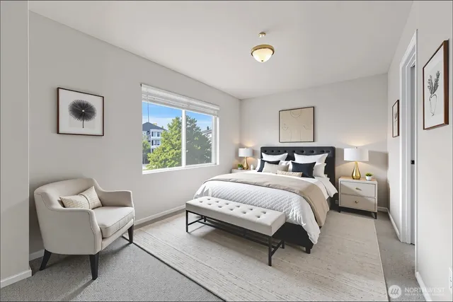 a spacious bedroom with a bed and a couch