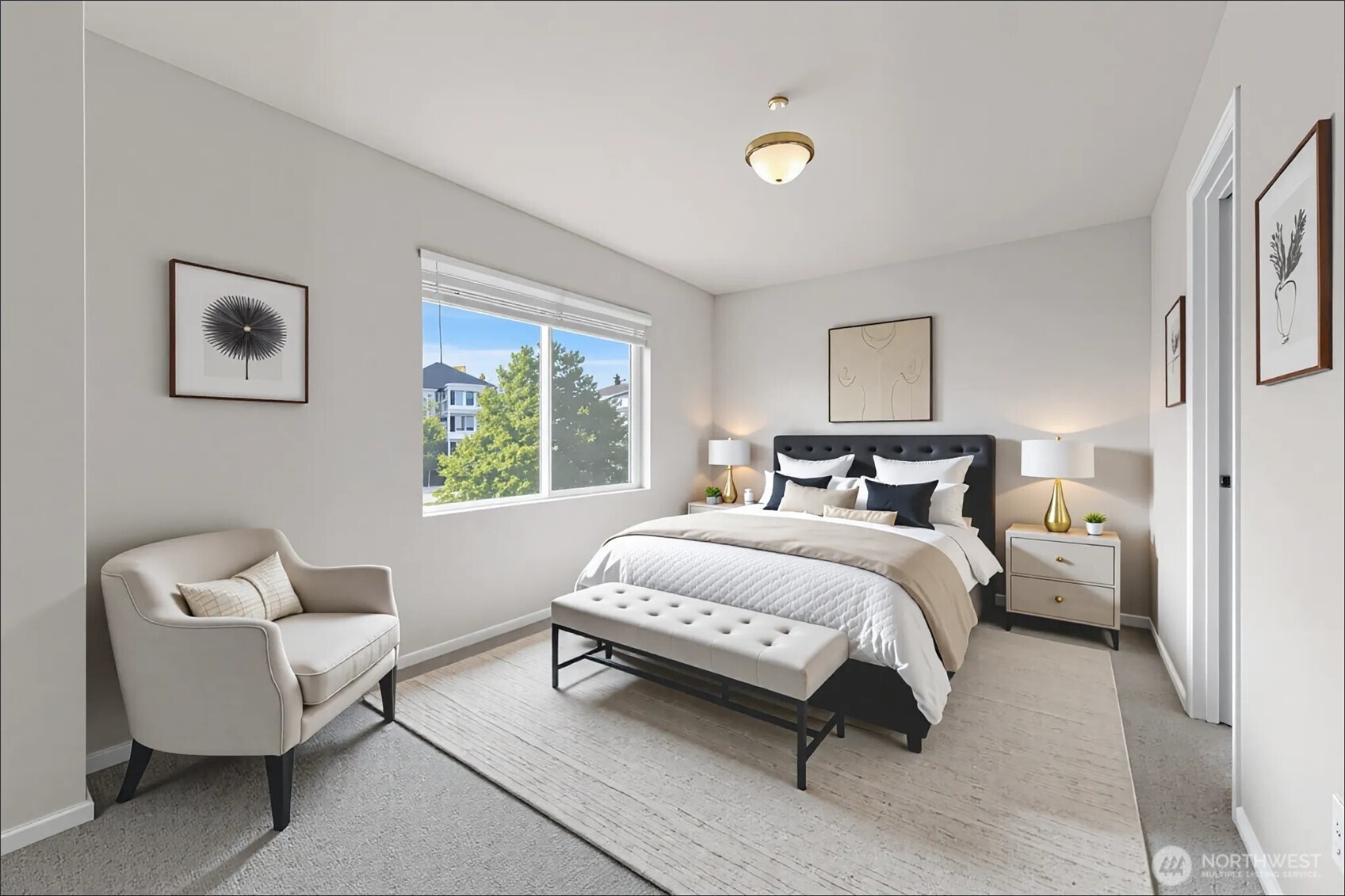 17417 118th Ave Court East, Unit E Puyallup, WA 98374 - Photo 22 of 31 a spacious bedroom with a bed and a couch