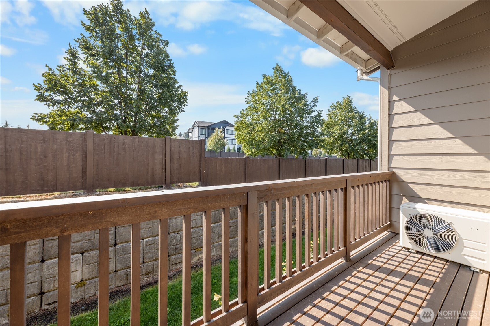 17417 118th Ave Court East, Unit E Puyallup, WA 98374 - Photo 27 of 31 a view of a wooden fence
