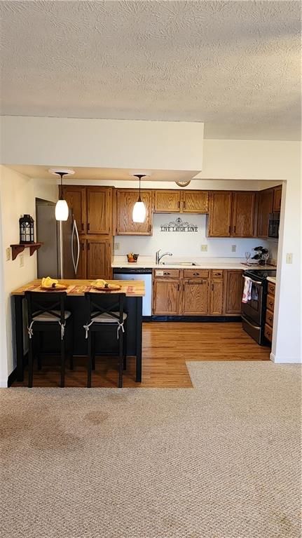 830 South Main Street, Unit 211 Washington, PA 15301 - Photo 4 of 17 a living room with a couch and dresser