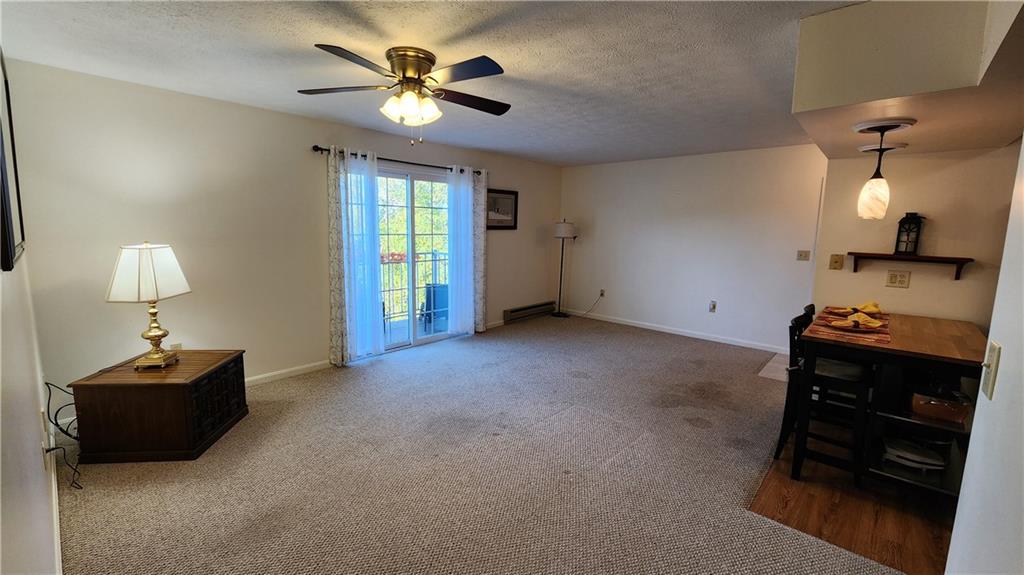 830 South Main Street, Unit 211 Washington, PA 15301 - Photo 6 of 17 a view of a livingroom with a workspace