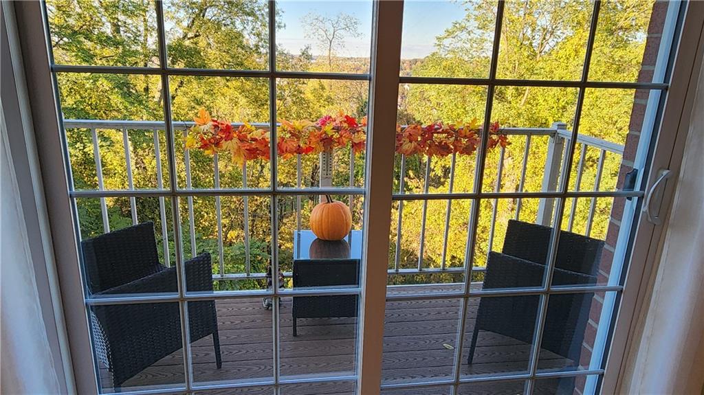 830 South Main Street, Unit 211 Washington, PA 15301 - Photo 7 of 17 a room with wooden floor and windows