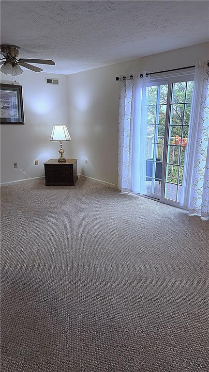 830 South Main Street, Unit 211 Washington, PA 15301 - Photo 8 of 17 a view of empty room with windows