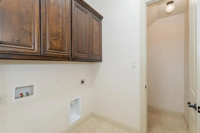 a view of a livingroom with a ceiling fan and wooden floor